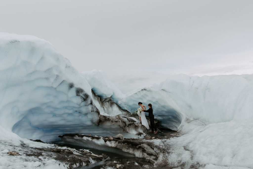 couple eloping on an alaskan glacier