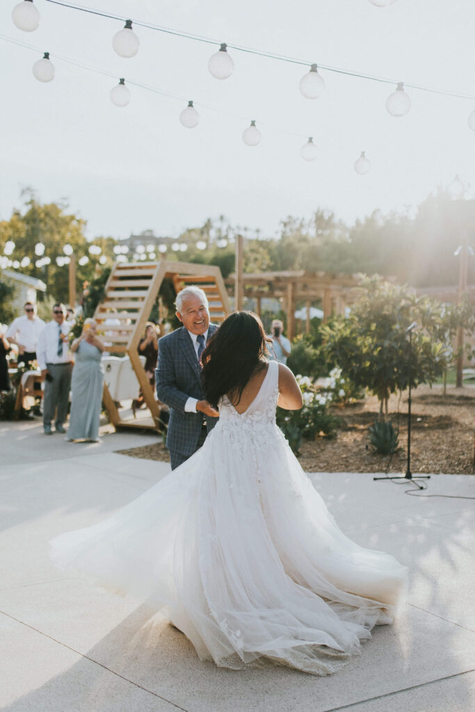 father daughter dance at summer outdoor wedding
