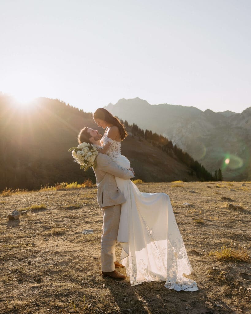 bride and groom get married in the mountains