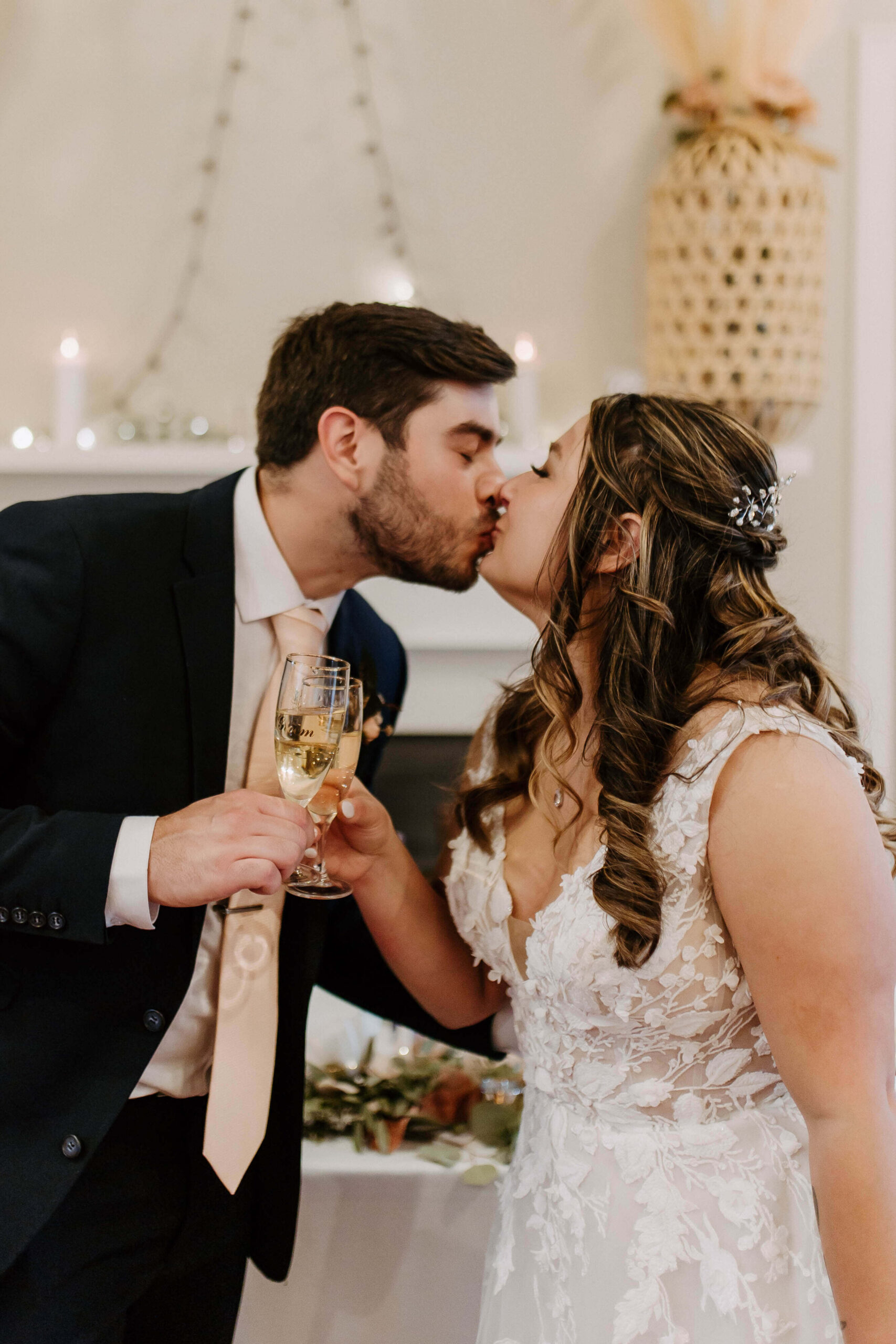 bride and groom cheers champagne at airbnb micro wedding