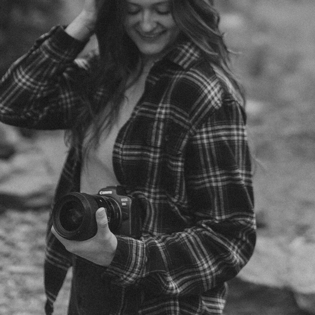 documentary photographer holding camera