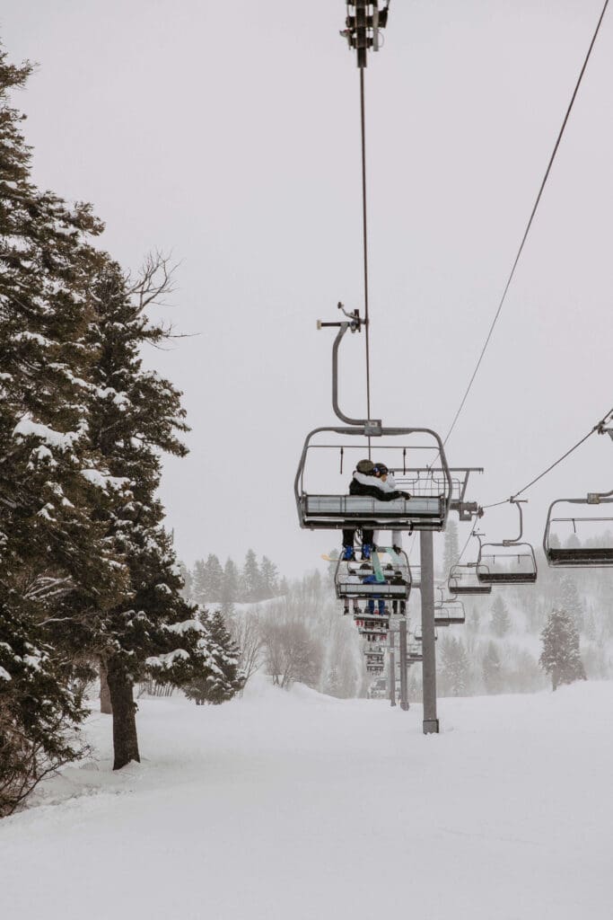 bride and groom spend their wedding day skiing snowbasin ski resort