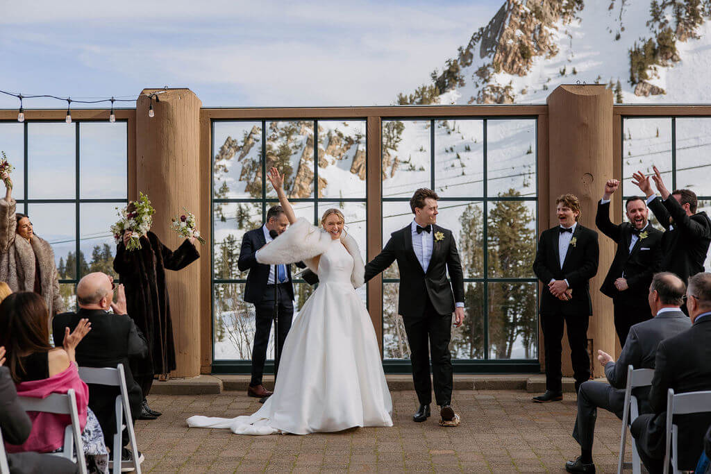 smashing the glass during outdoor winter wedding at snowbasin resort
