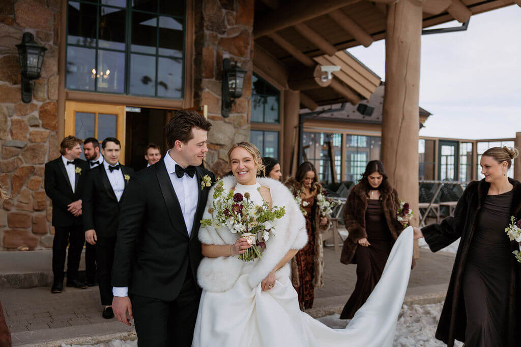 wedding party outside needles lodge at snowbasin resort