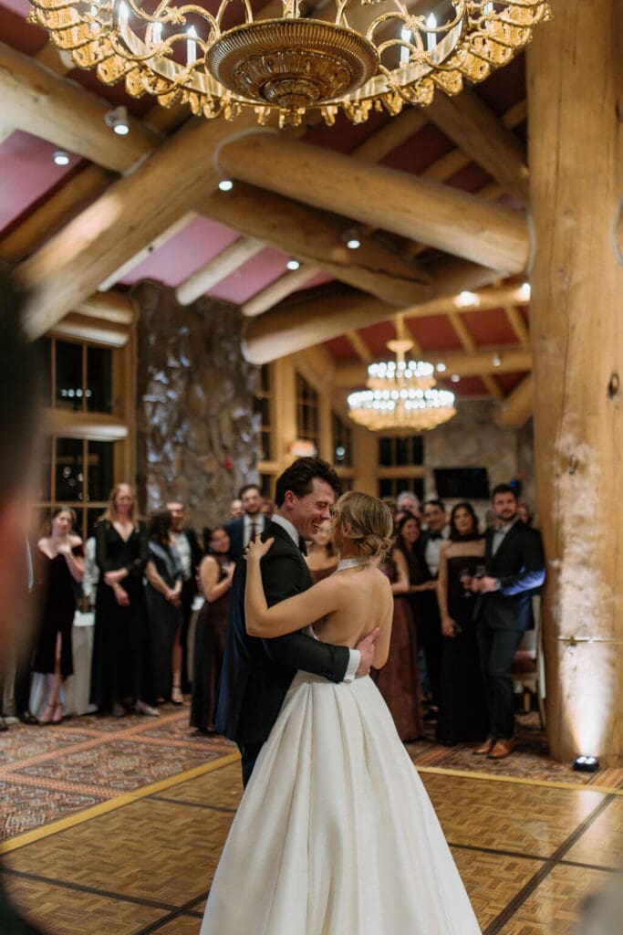 bride and groom first dance in needles lodge at snowbasin resort