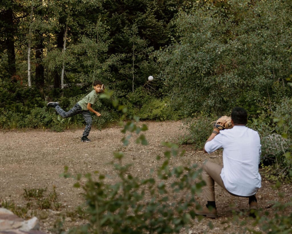 dad and son playing baseball