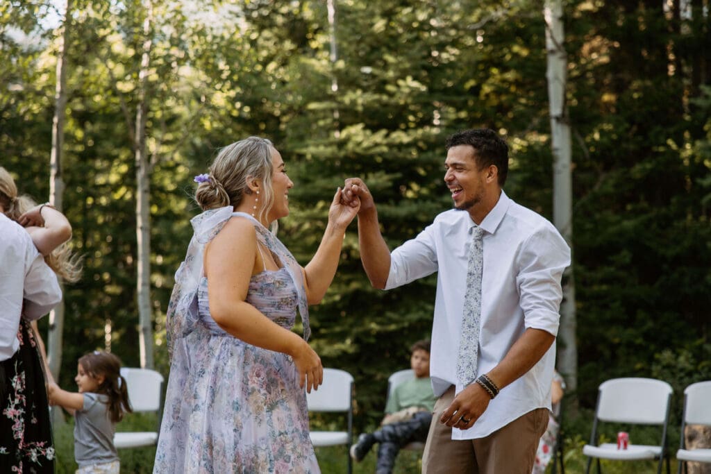 wedding guests dancing at utah outdoor wedding