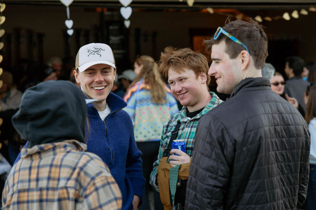people hanging out during apres ski wedding party at powder mountain
