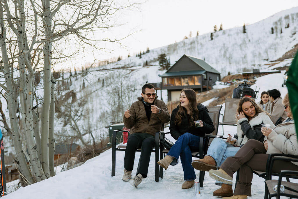 people hanging out during apres ski wedding party at powder mountain