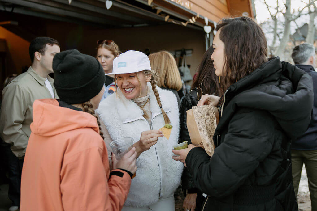 people hanging out during apres ski wedding party at powder mountain