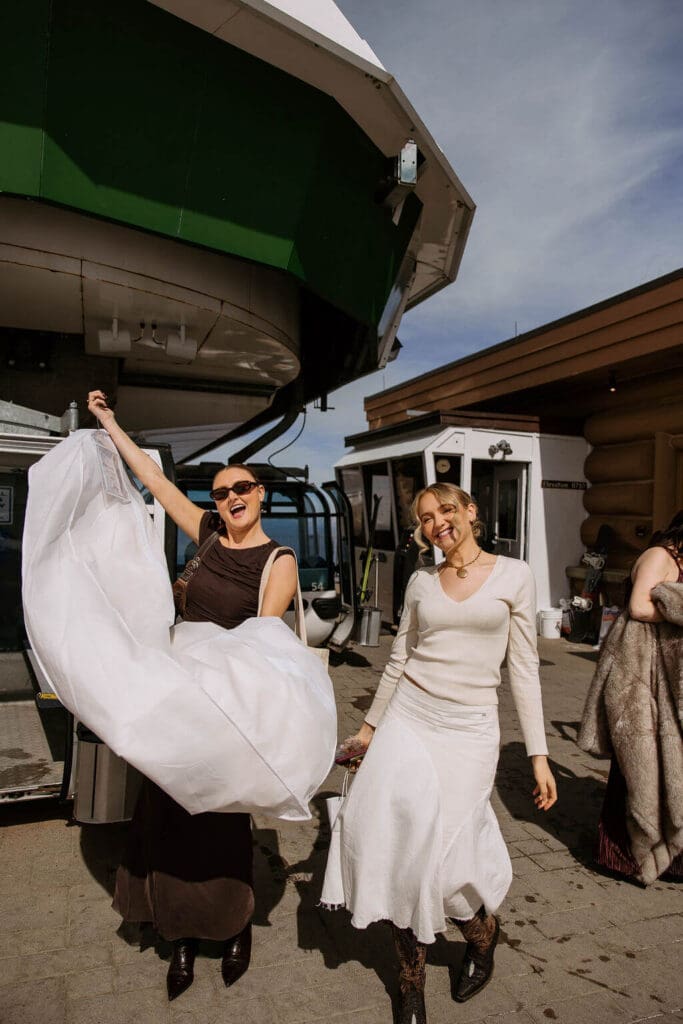 bride and maid of honor arrive at snowbasin resort