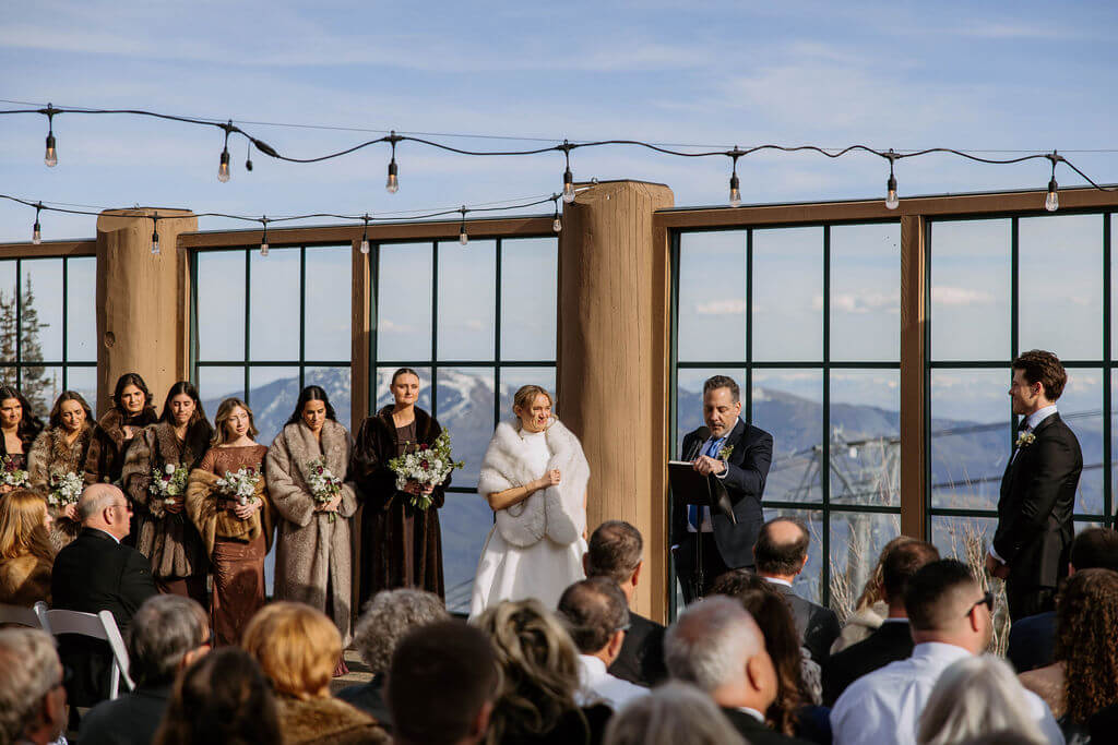 winter wedding ceremony at needles lodge at snowbasin resort 