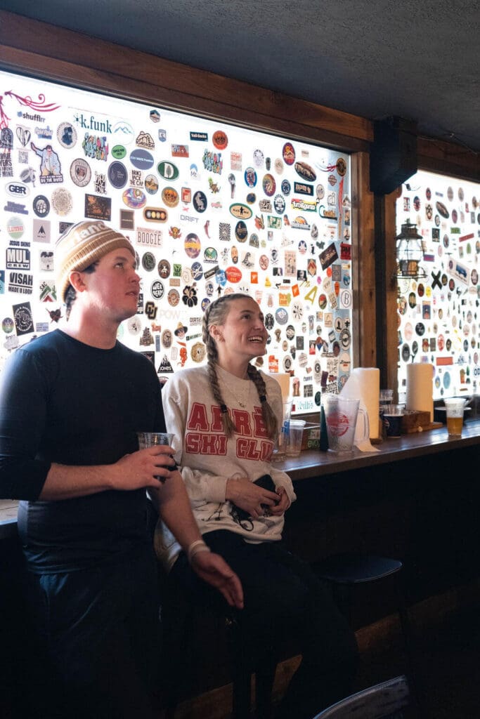 people hanging out in powder keg at powder mountain