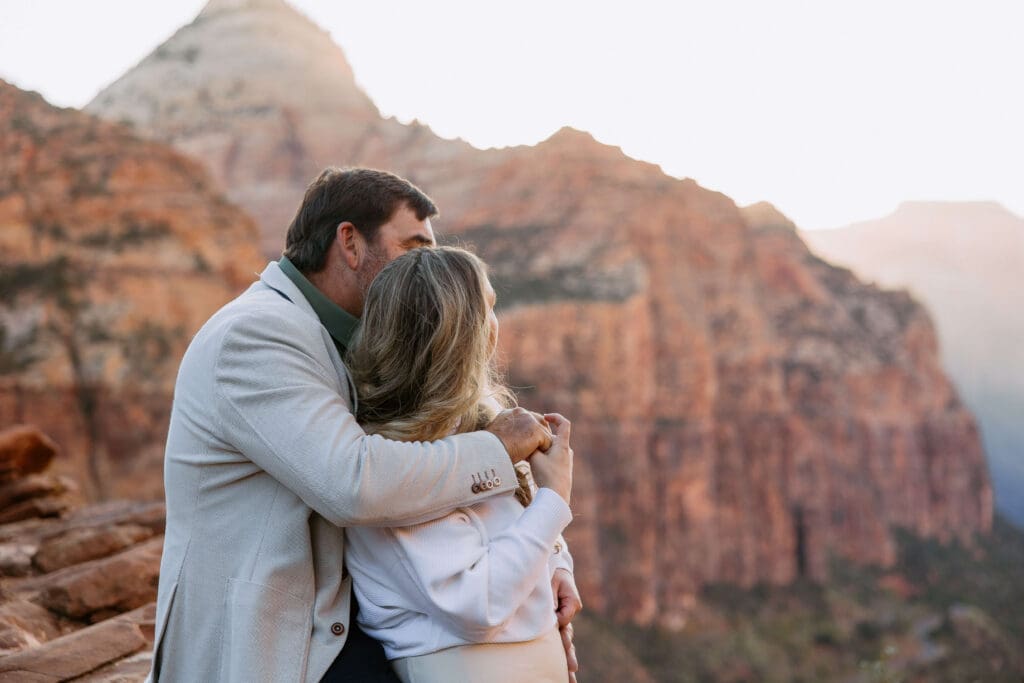 bride and groom take in the views of zion on their intimate elopement day