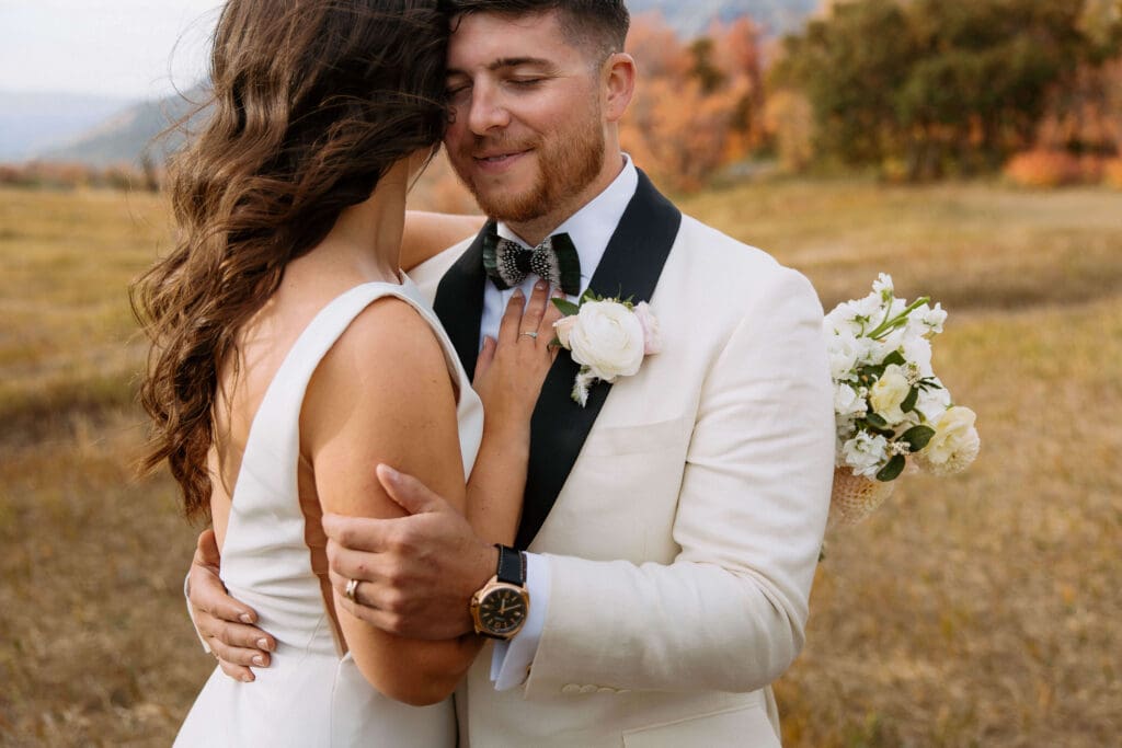 bride and groom in utah's mountains